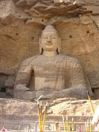 Arheologi chinezi au descoperit resturi de metale preţioase pe celebrele statui din Grotele Longmen